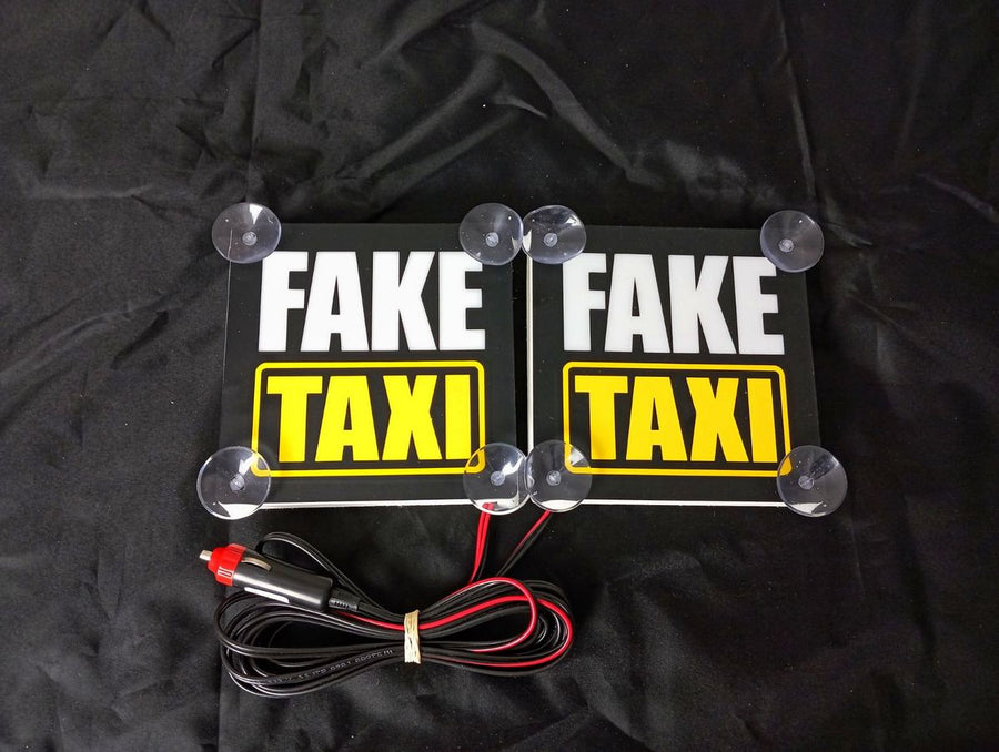 Черни вътрешни табели за предно стъкло Fake Taxi, жълто-бяло